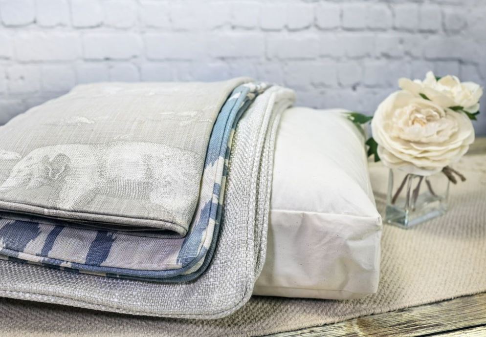 Should cushion inserts be bigger than the cushion cover?