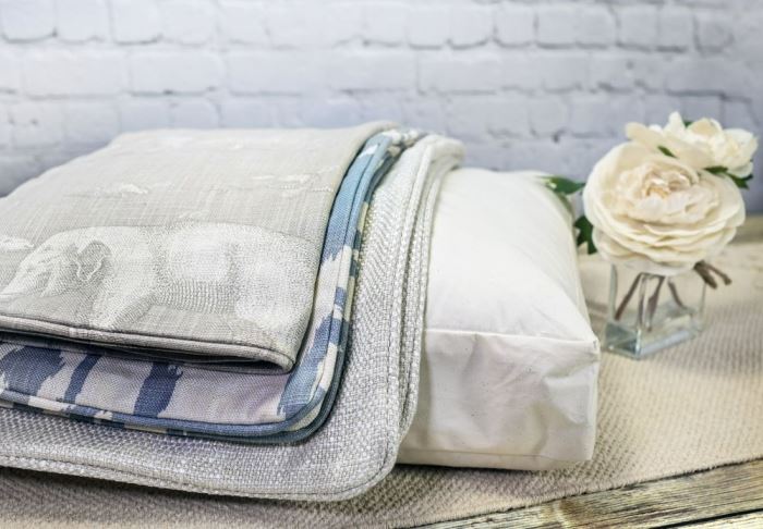 Should cushion inserts be bigger than the cushion cover?